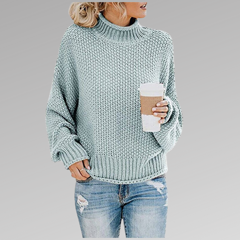 Women's orange high-neck sweater featuring a soft cozy knit and draped fit, perfect for stylish layering in cooler weather. 5