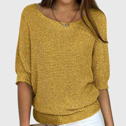Women's beige sweater featuring a relaxed fit and soft smooth texture, perfect for versatile styling in any casual wardrobe. 4