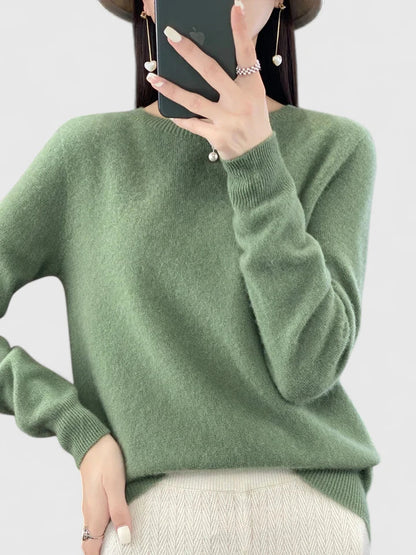 Women’s turquoise sweater featuring a relaxed fit and made from soft, warm material, perfect for cozy layering and versatile styling. 0