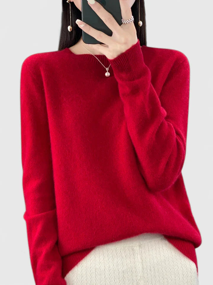 Women’s turquoise sweater featuring a relaxed fit and made from soft, warm material, perfect for cozy layering and versatile styling. 10