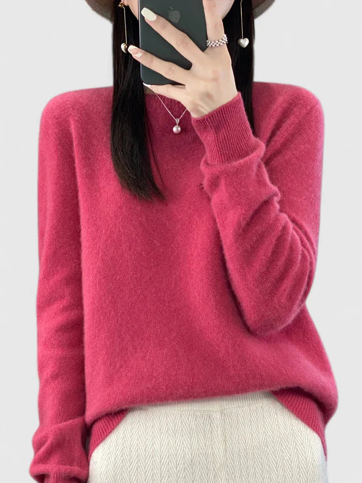 Women’s turquoise sweater featuring a relaxed fit and made from soft, warm material, perfect for cozy layering and versatile styling. 12