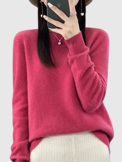 Women’s turquoise sweater featuring a relaxed fit and made from soft, warm material, perfect for cozy layering and versatile styling. 12
