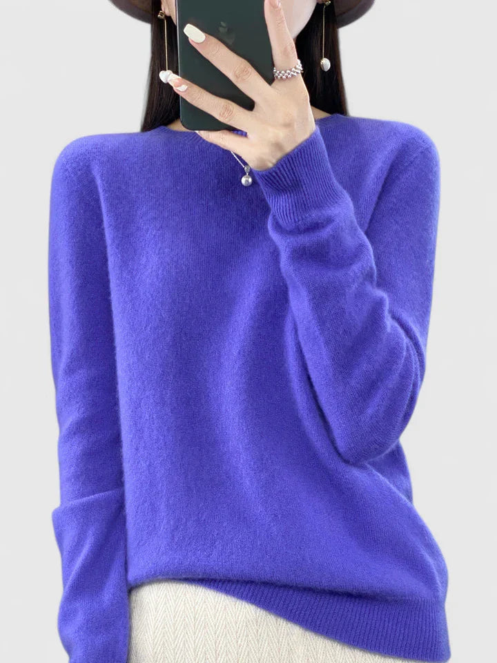Women’s turquoise sweater featuring a relaxed fit and made from soft, warm material, perfect for cozy layering and versatile styling. 13