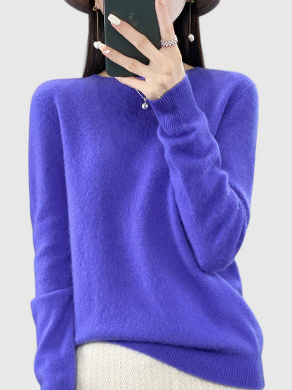 Women’s turquoise sweater featuring a relaxed fit and made from soft, warm material, perfect for cozy layering and versatile styling. 13