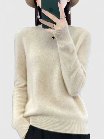 Women’s turquoise sweater featuring a relaxed fit and made from soft, warm material, perfect for cozy layering and versatile styling. 15
