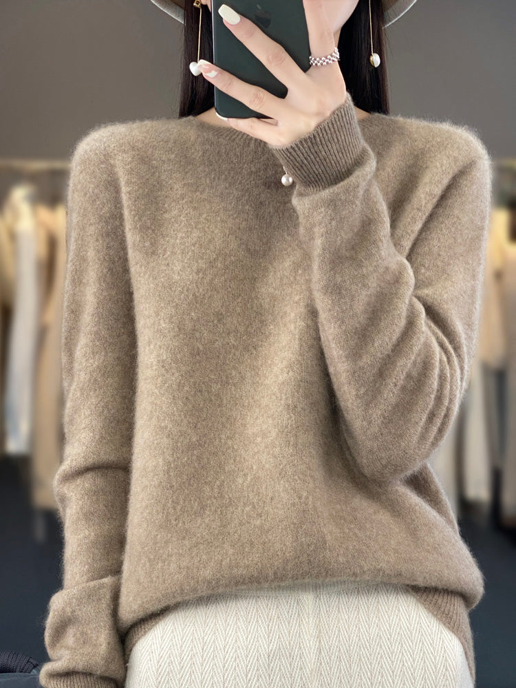 Women’s turquoise sweater featuring a relaxed fit and made from soft, warm material, perfect for cozy layering and versatile styling. 6