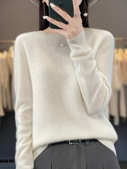 Women’s turquoise sweater featuring a relaxed fit and made from soft, warm material, perfect for cozy layering and versatile styling. 7