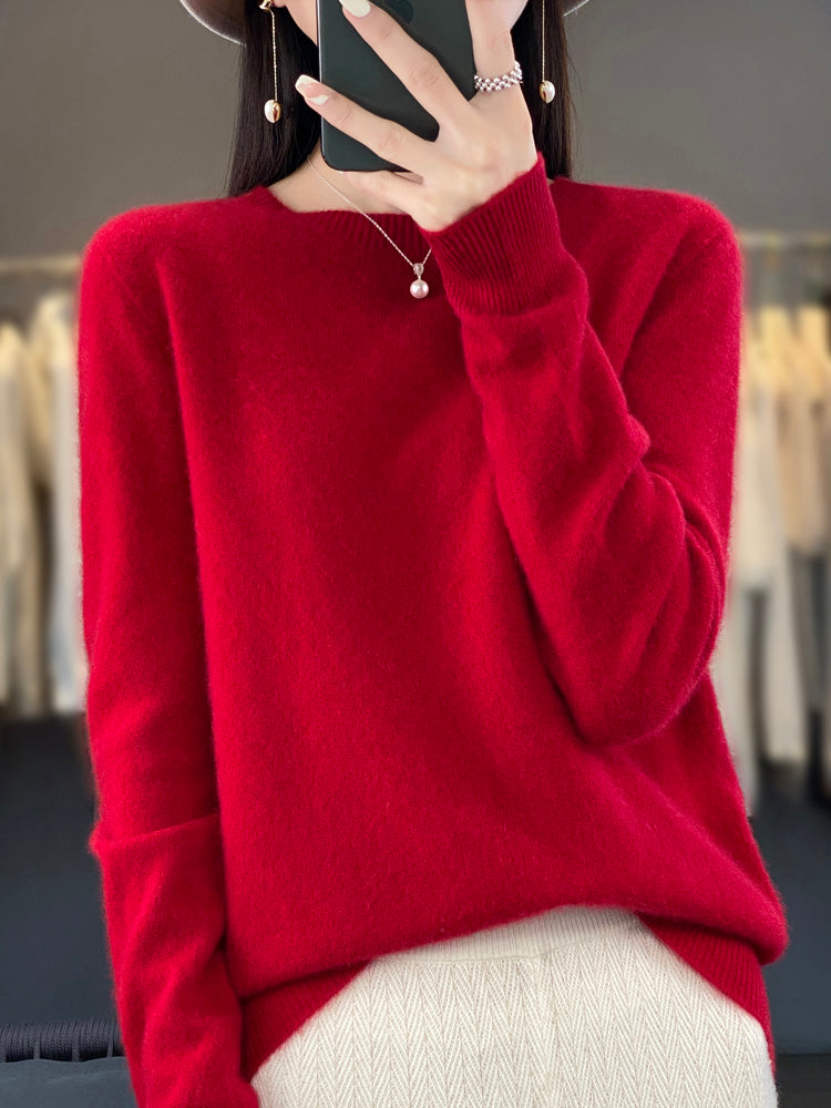 Women’s turquoise sweater featuring a relaxed fit and made from soft, warm material, perfect for cozy layering and versatile styling. 8