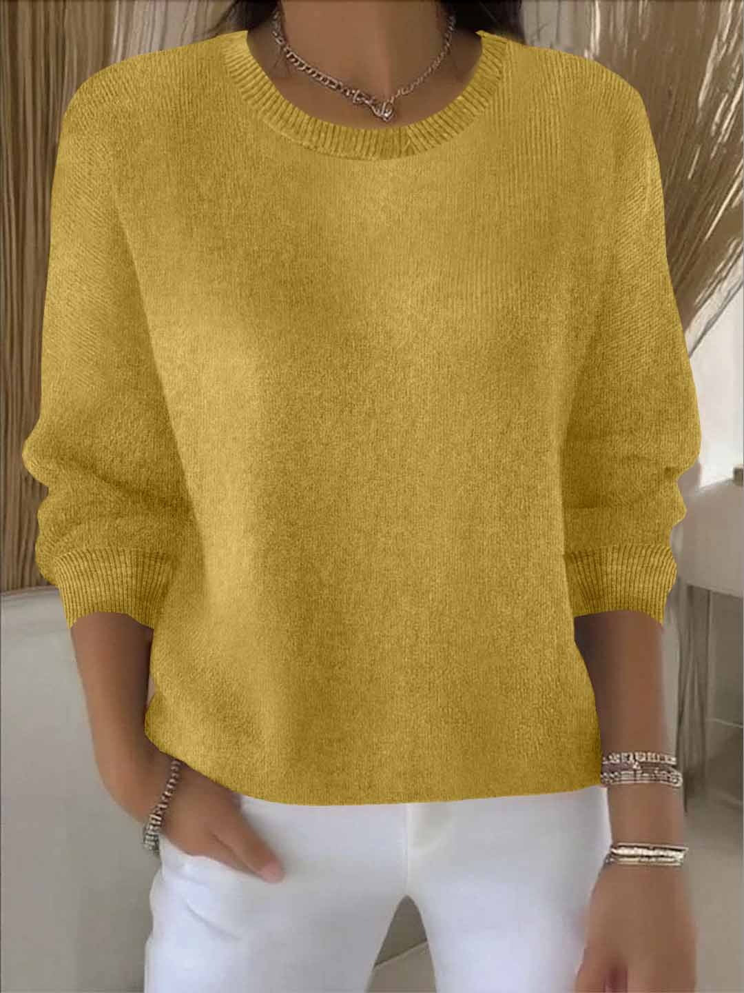 Women's yellow sweater featuring a soft and warm fabric, designed for cozy everyday wear with an elegant style. 0