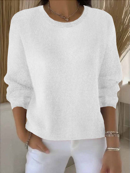 Women's yellow sweater featuring a soft and warm fabric, designed for cozy everyday wear with an elegant style. 1