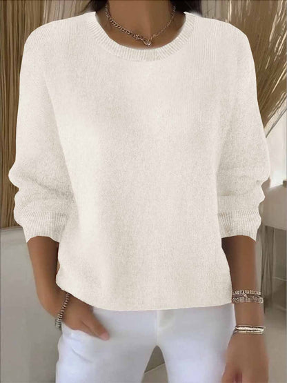 Women's yellow sweater featuring a soft and warm fabric, designed for cozy everyday wear with an elegant style. 2