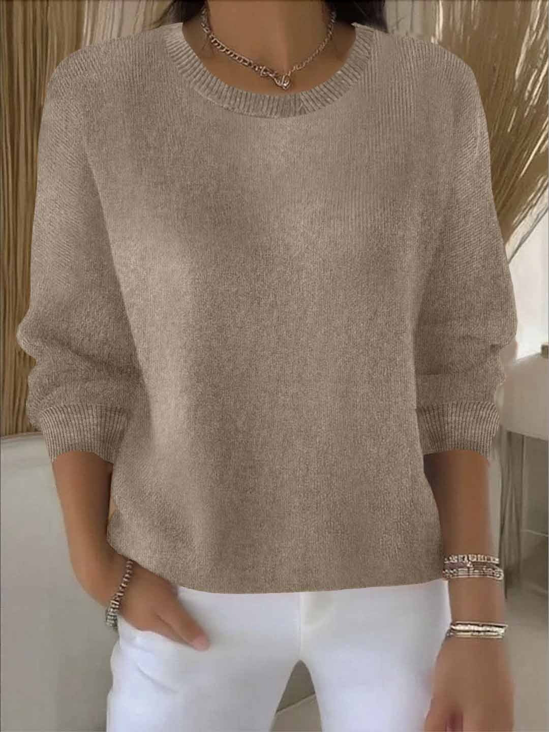 Women's yellow sweater featuring a soft and warm fabric, designed for cozy everyday wear with an elegant style. 3