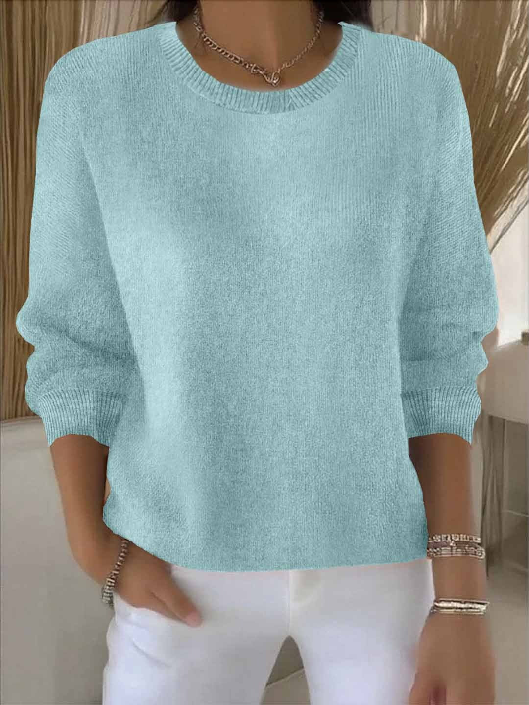 Women's yellow sweater featuring a soft and warm fabric, designed for cozy everyday wear with an elegant style. 6