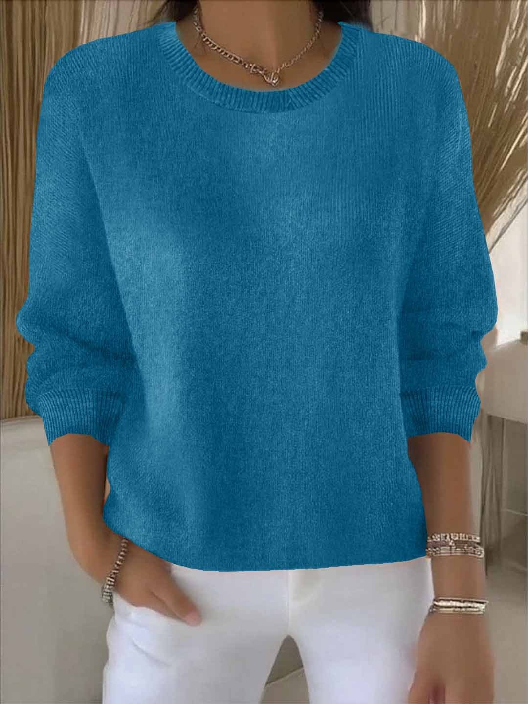 Women's yellow sweater featuring a soft and warm fabric, designed for cozy everyday wear with an elegant style. 7