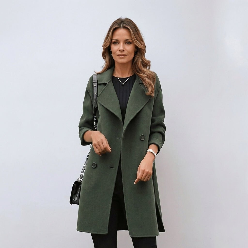 Women's mid-length trench coat featuring a double breasted closure and notched lapel, perfect for stylish warmth during winter. 1