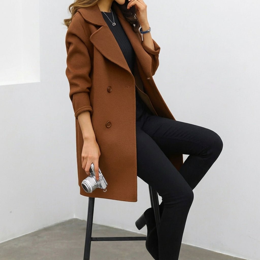 Women's mid-length trench coat featuring a double breasted closure and notched lapel, perfect for stylish warmth during winter. 4