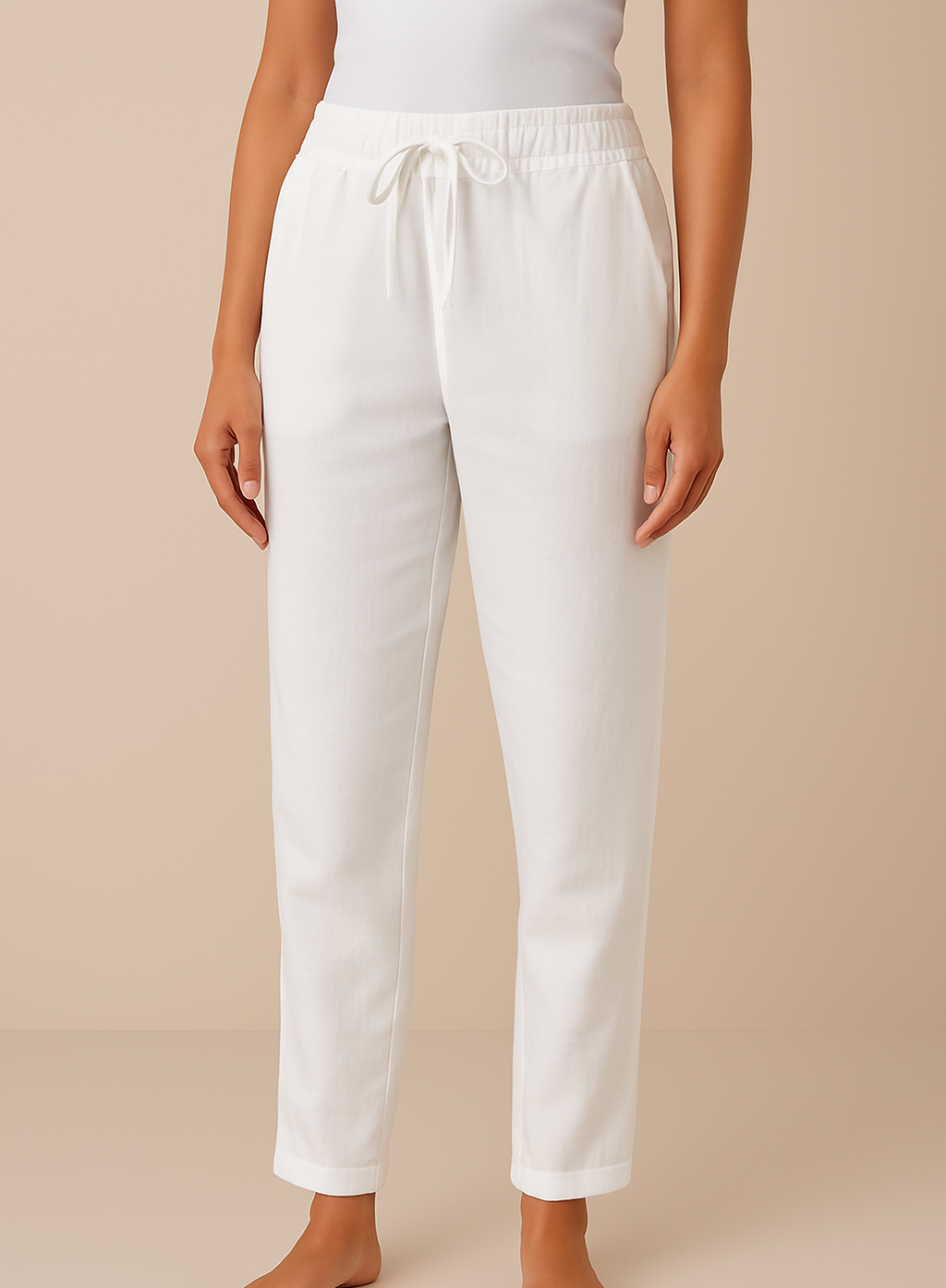 Women's trousers featuring an elastic waist and drawstring, designed in a modern straight leg style for ultimate comfort and versatility. 3