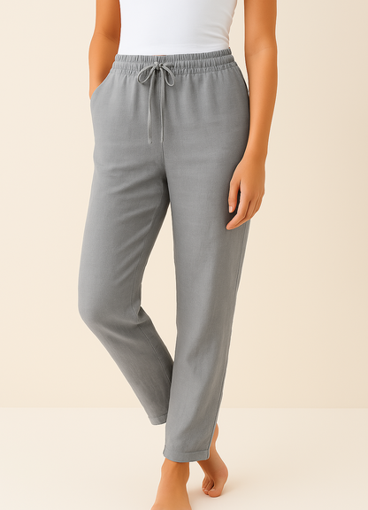 Women's trousers featuring an elastic waist and drawstring, designed in a modern straight leg style for ultimate comfort and versatility. 4