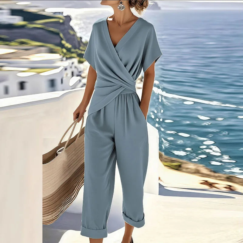 Women's two-piece outfit featuring a stylish twist-front design, crafted from soft fabric for a relaxed fit, perfect for casual and chic occasions. 2