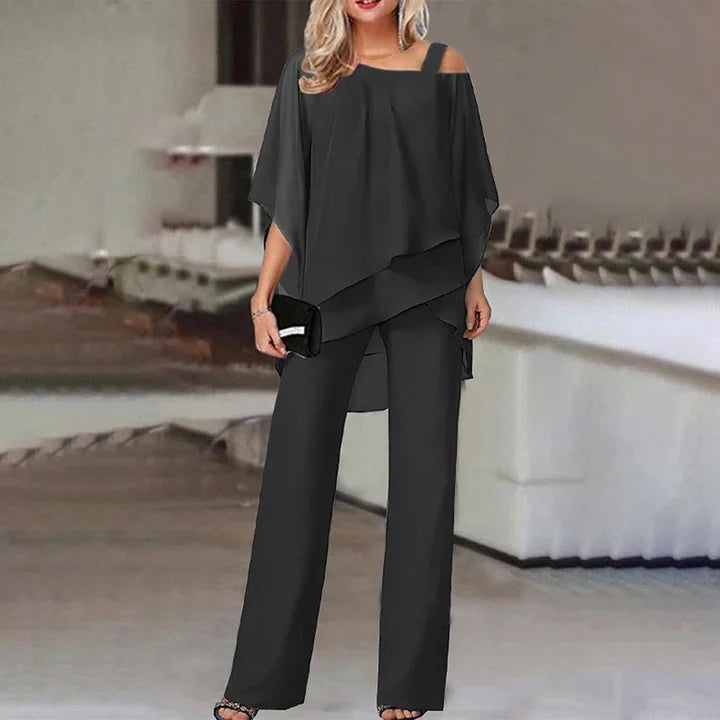 Women's two piece set featuring a stylish layered design and relaxed fit trousers, perfect for elegant casual outings or comfortable everyday wear. 1