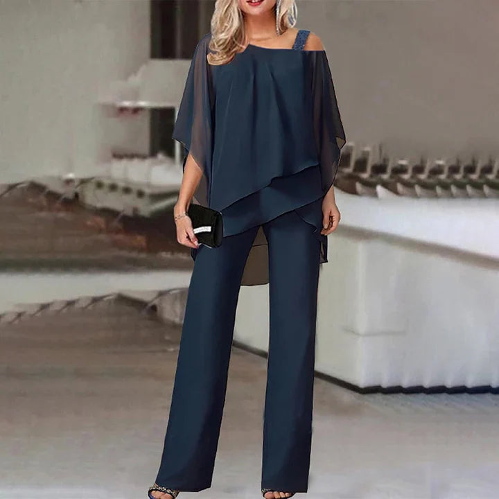Women's two piece set featuring a stylish layered design and relaxed fit trousers, perfect for elegant casual outings or comfortable everyday wear. 5