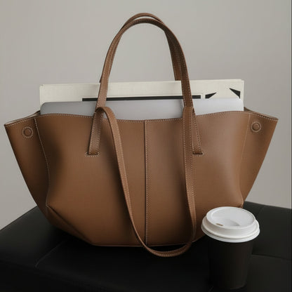 Women's vintage tote bag featuring a spacious interior, made from durable fabric, perfect for everyday carry as a large shoulder handbag. 3