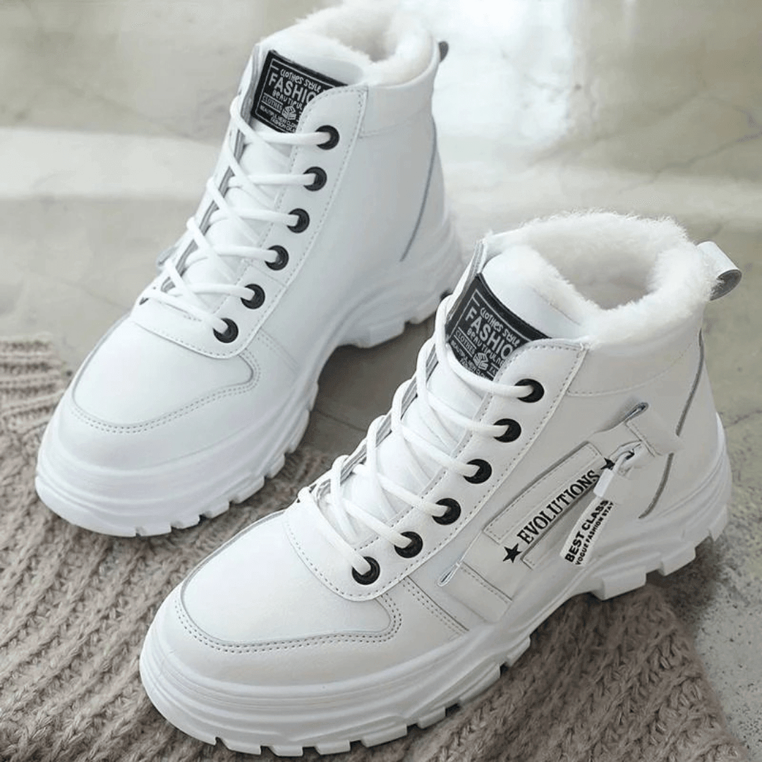 Women's waterproof insulated snow boots featuring an anti-slip sole, designed for modern winter adventures with a stylish look and superior warmth. 1