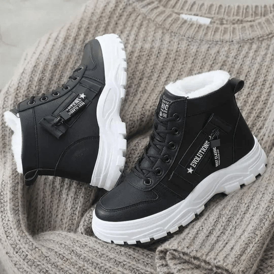 Women's waterproof insulated snow boots featuring an anti-slip sole, designed for modern winter adventures with a stylish look and superior warmth. 2