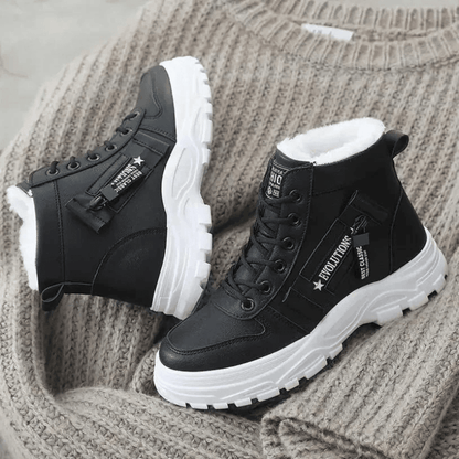 Women's waterproof insulated snow boots featuring an anti-slip sole, designed for modern winter adventures with a stylish look and superior warmth. 2