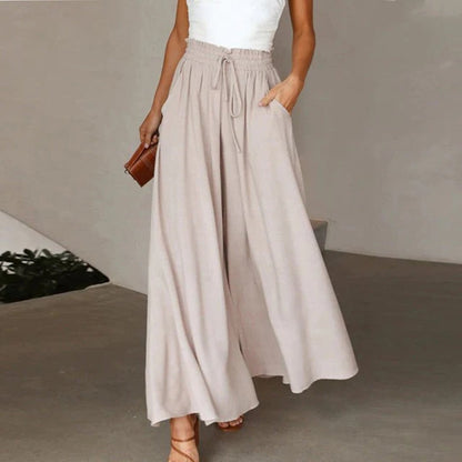 Women's wide leg pants featuring a high waist and drawstring tie, designed in a lightweight and breathable palazzo style, perfect for comfort and effortless elegance. 5