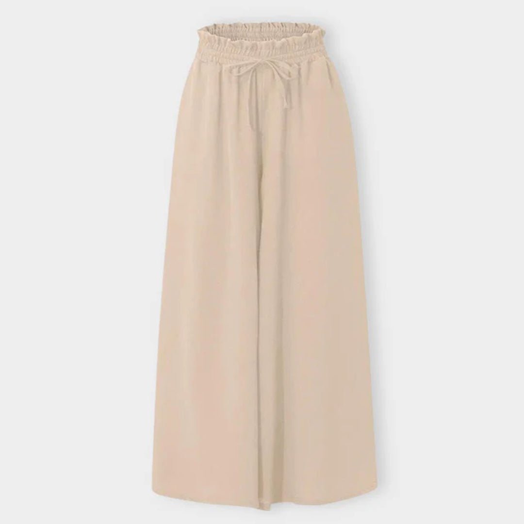 Women's wide leg pants featuring a high waist and drawstring tie, designed in a lightweight and breathable palazzo style, perfect for comfort and effortless elegance. 7