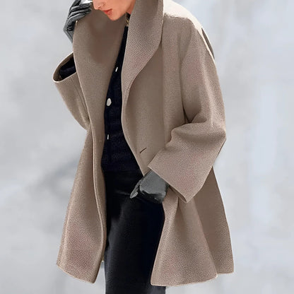 Women's winter coat featuring a relaxed fit and elegant silhouette, crafted from a durable polyester blend, designed as a longline jacket for warmth and style during cold 5