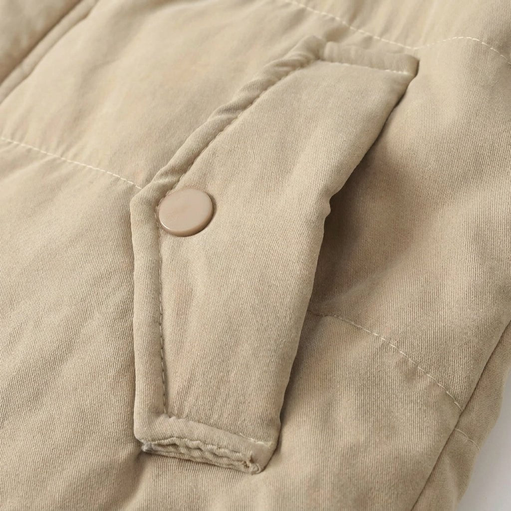 Women's winter jacket featuring a plush lining, structured hood, and zip-up design, perfect for keeping warm in cold weather. 4