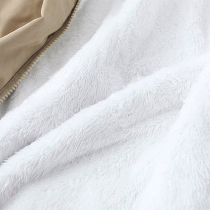 Women's winter jacket featuring a plush lining, structured hood, and zip-up design, perfect for keeping warm in cold weather. 5