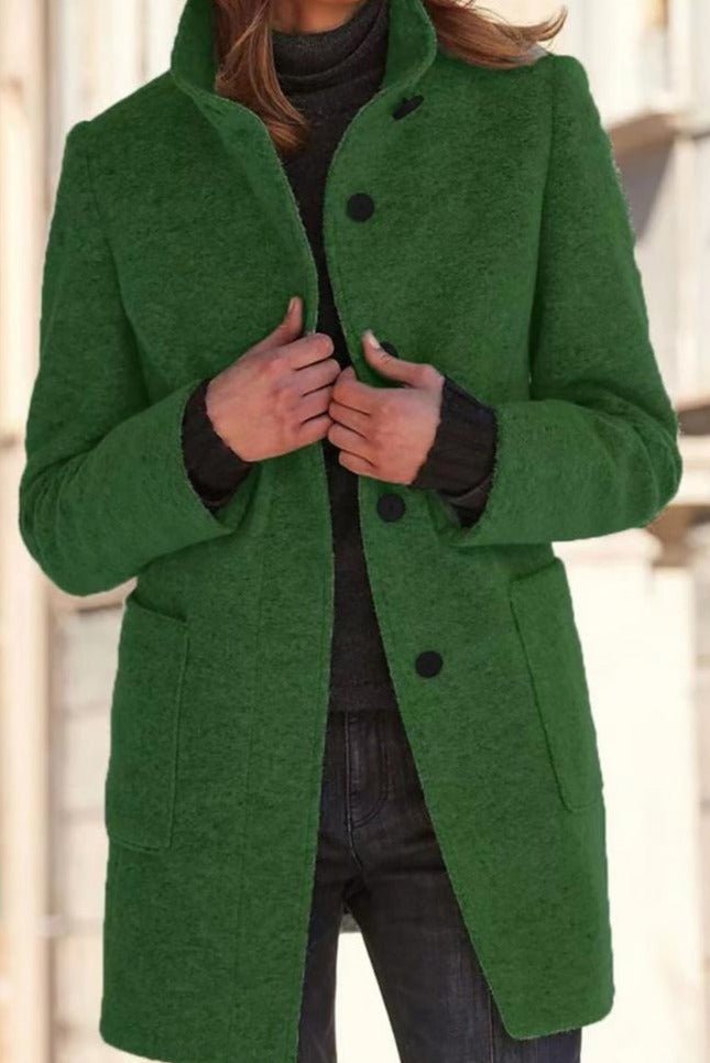 Women's wool coat featuring a tailored fit and timeless button design, perfect for elegant winter outerwear. 2