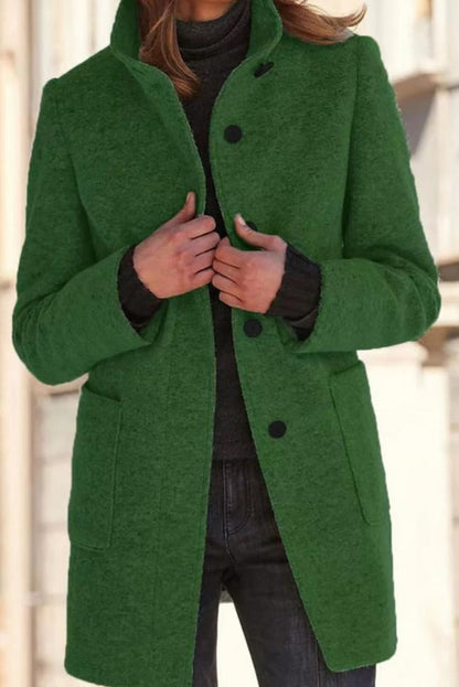 Women's wool coat featuring a tailored fit and timeless button design, perfect for elegant winter outerwear. 2