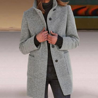 Women's wool coat featuring a tailored fit and timeless button design, perfect for elegant winter outerwear. 5