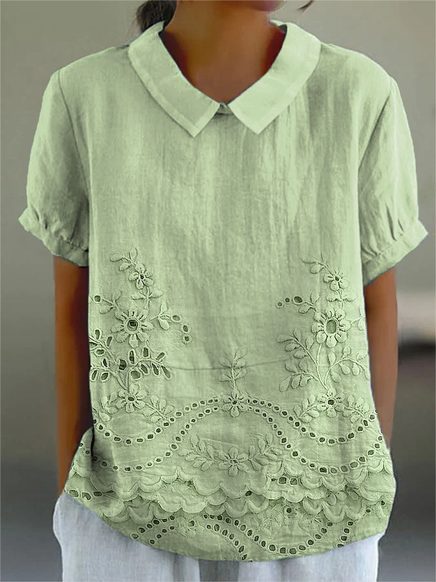 Womens blouse featuring delicate floral embroidery in a soft pink cotton linen blend with a relaxed fit. 3