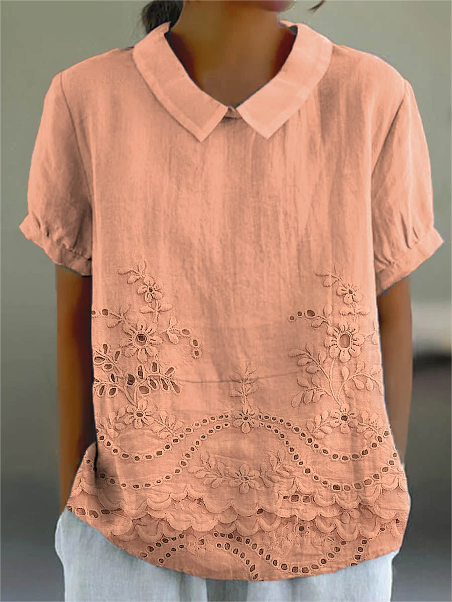 Womens blouse featuring delicate floral embroidery in a soft pink cotton linen blend with a relaxed fit. 5