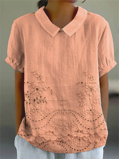 Womens blouse featuring delicate floral embroidery in a soft pink cotton linen blend with a relaxed fit. 5