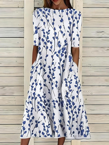 Women’s A-Line mid-length summer dress featuring a vibrant floral print, perfect for casual outings and warm weather occasions. 0