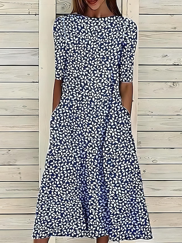 Women’s A-Line mid-length summer dress featuring a vibrant floral print, perfect for casual outings and warm weather occasions. 1