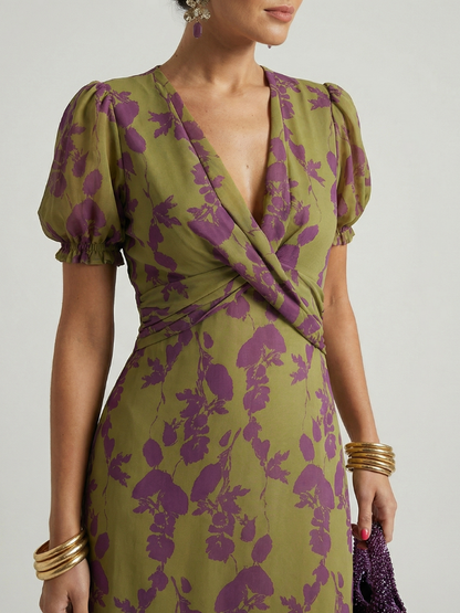 Womens floral midi dress featuring a wrap bodice and short sleeves, perfect for summer, made from lightweight fabric for comfort and style. 2