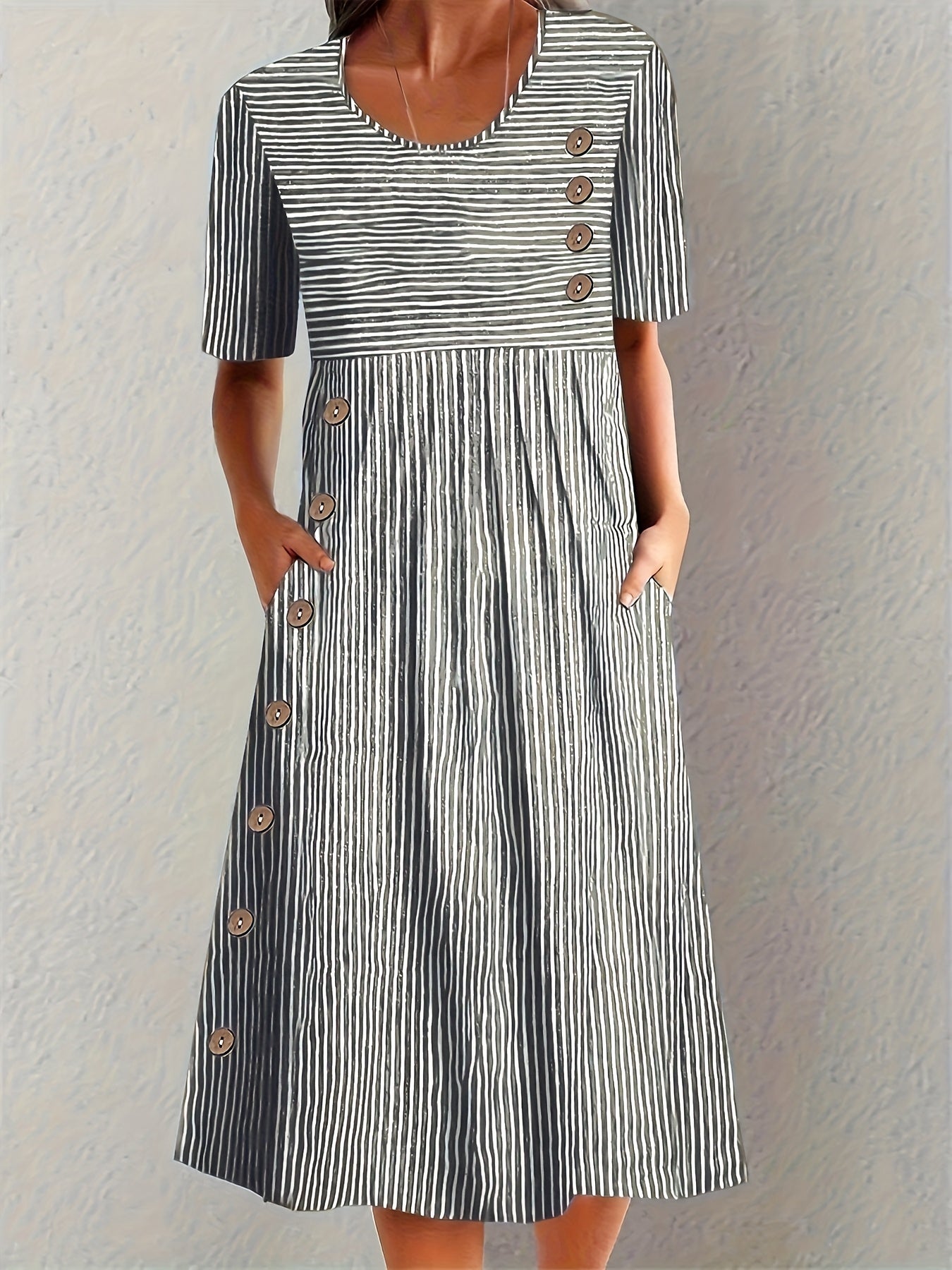 Womens striped summer dress featuring a flattering fit, breathable fabric, and midi length, perfect for casual wear. 2