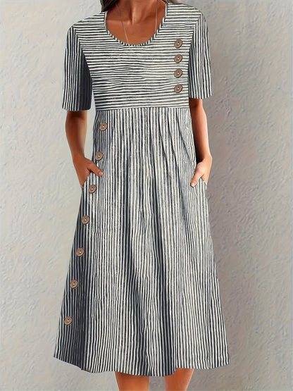 Womens striped summer dress featuring a flattering fit, breathable fabric, and midi length, perfect for casual wear. 2