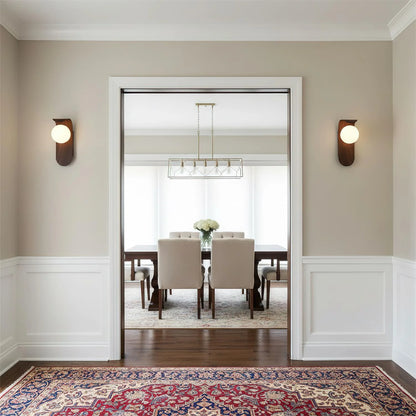 Wood wall light featuring a dimmable opal globe shade, designed as a modern bathroom sconce to create a cozy ambiance. 3