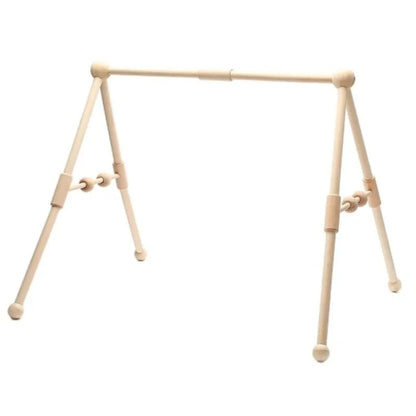 Wooden baby play gym featuring a natural wood minimalist design, equipped with colorful sensory toys for newborn and infant development. 4