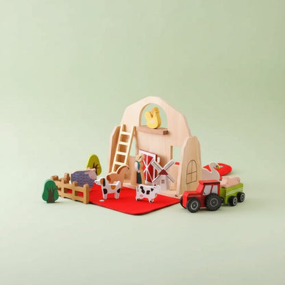 Wooden Travel Farm Playset featuring a barn-shaped case and assorted animal figures, perfect for imaginative play on the go. 1