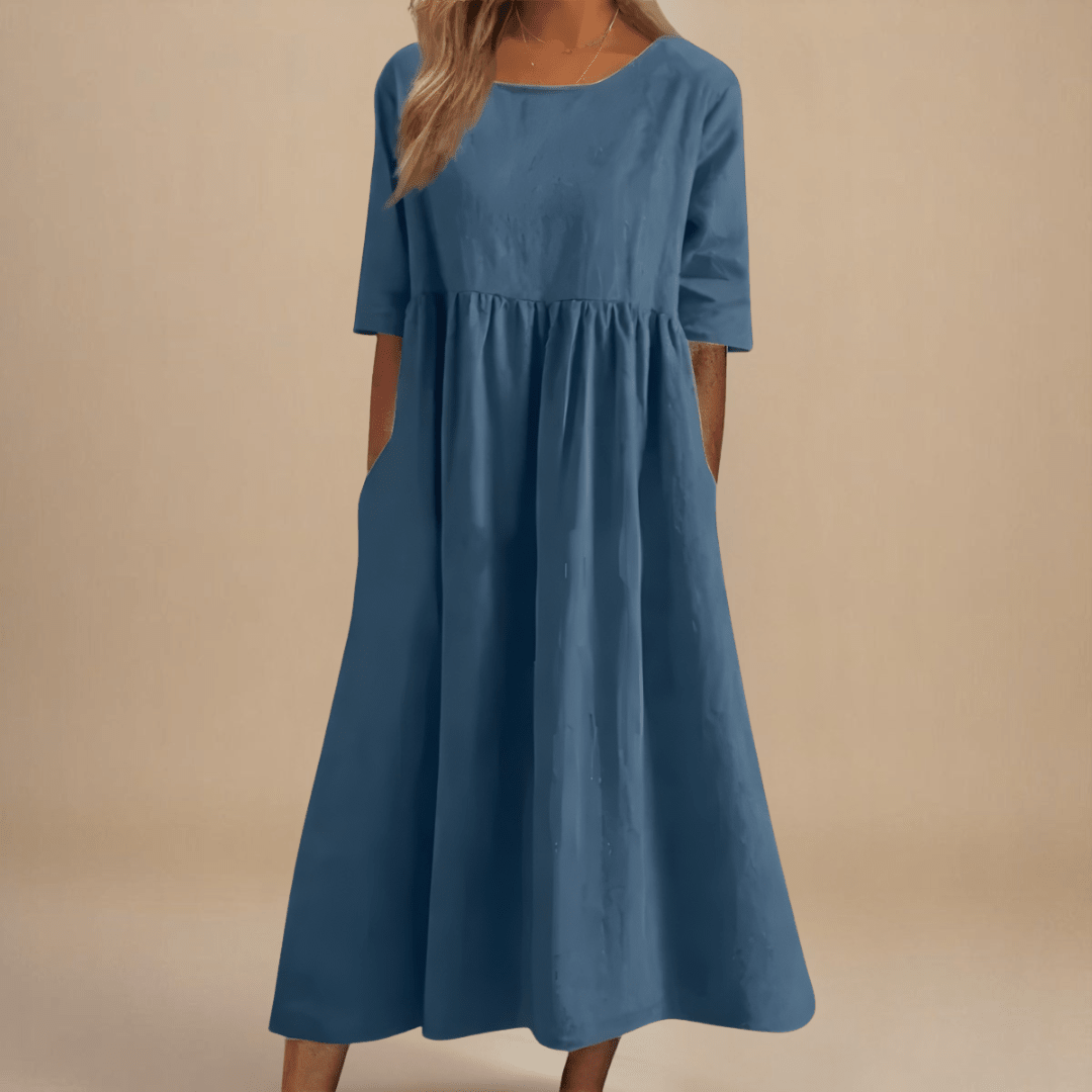 A-line dress for women featuring discreet pockets and made from soft fabric, perfect for everyday comfort and style. 1