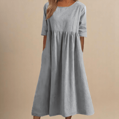 A-line dress for women featuring discreet pockets and made from soft fabric, perfect for everyday comfort and style. 7